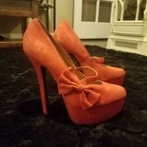 Salmon pink coral platform suede heels with bow